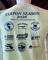 T-shirt with 'Tarpon Season 2026' text and sponsor logos on a mannequin.
